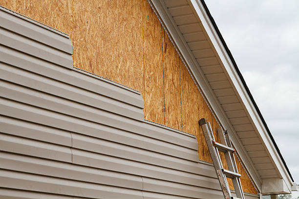 Professional Siding technician working in Glenville, WV